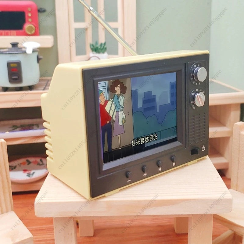 Vintage-style television set with cartoon on screen in a room setting