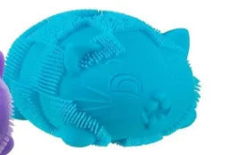 Blue cat-shaped object with a purple item partially visible